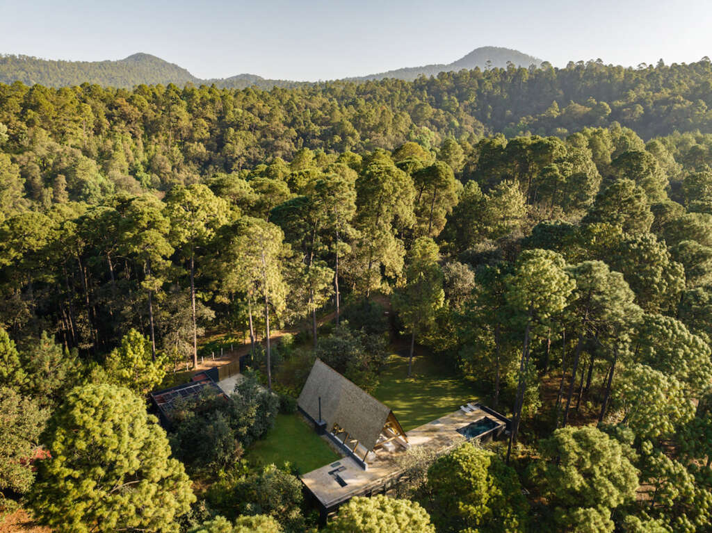 PPAA design A-Frame house on sloped clearing outside Mexico City