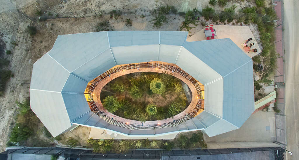 This climate house in Spain uses rainwater and greywater to regenerate its natural landscape