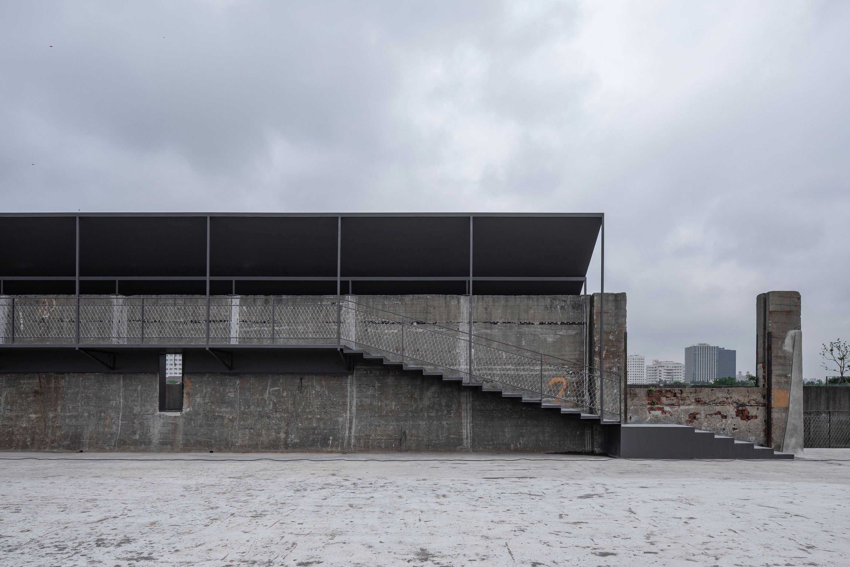 Atelier Deshaus repurpose an old concrete wharf into a contemporary passageway