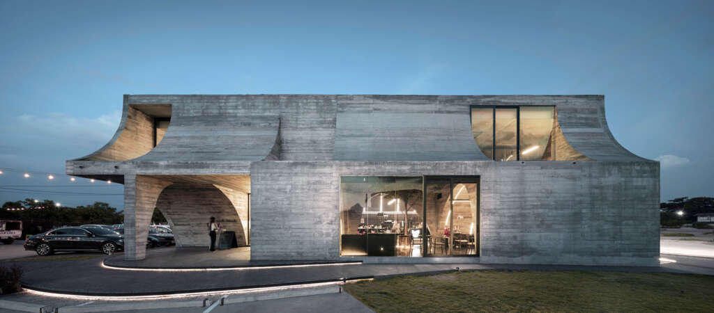 This French café in Thailand is inspired by the imperfect shape of a croissant