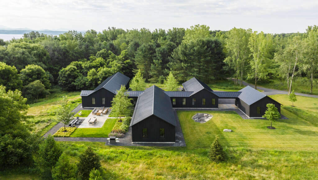 Birdseye design sleek four-gabled homestead in Vermont