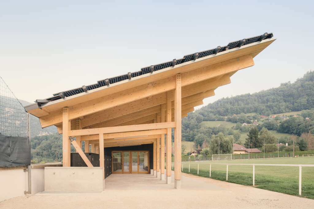 Anthony Laffargue design angular clubhouse using spruce timber and photovoltaic panels