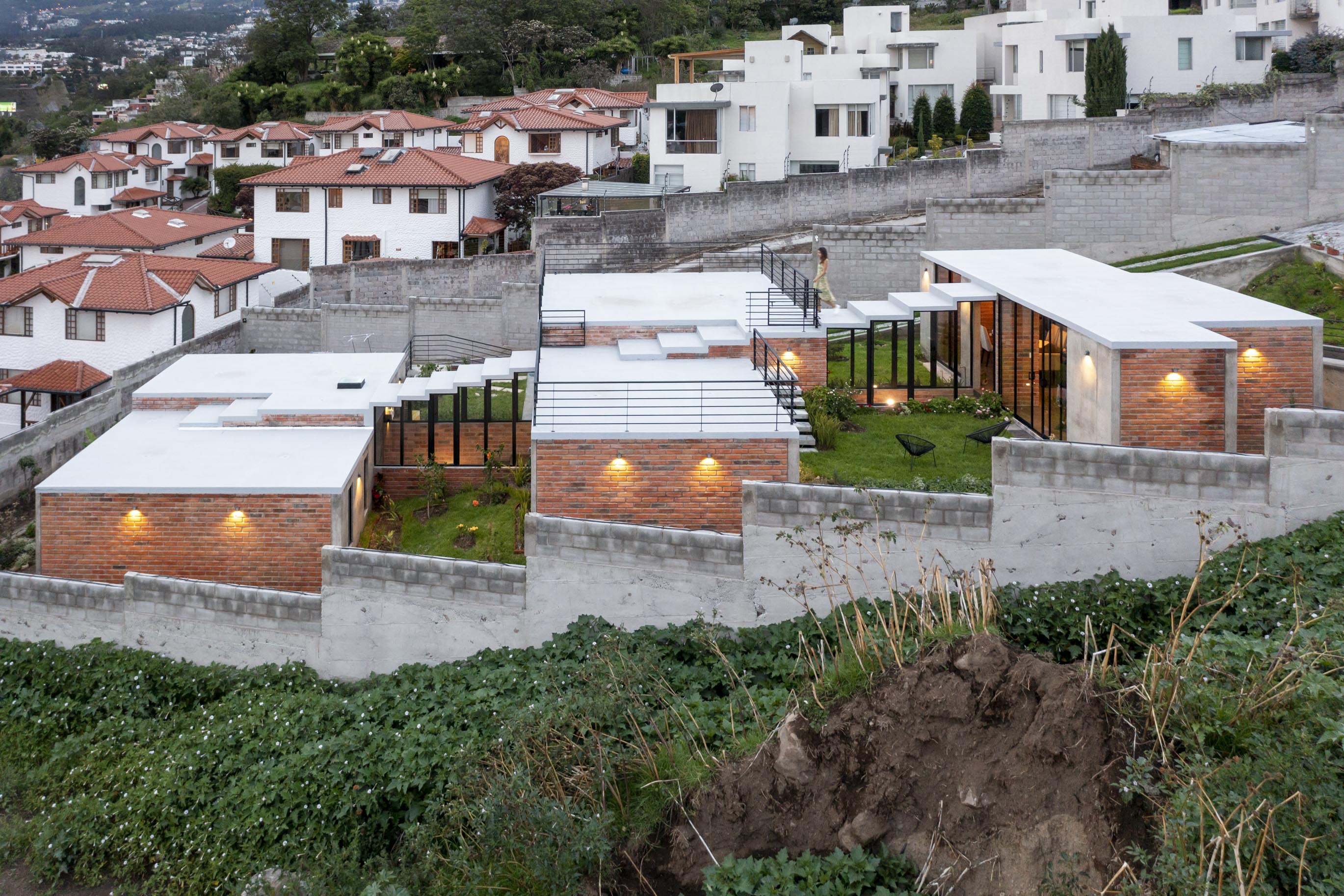 This house in Ecuador uses indoor and outdoor steps for family independence and privacy
