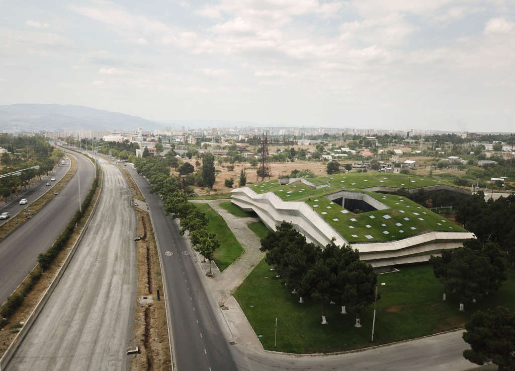 This coffee plant in Tbilisi features a rippled concrete facade