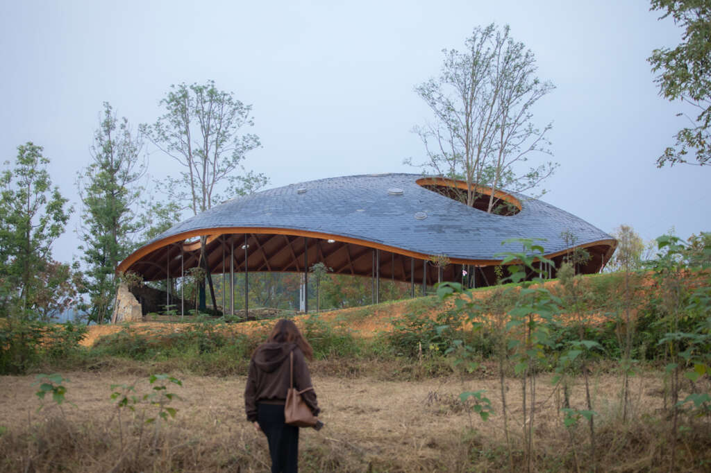 Heilongtan Dome Music Hall -- A spiritual Sanctuary on a lakeside slope by Studio Dali Architects