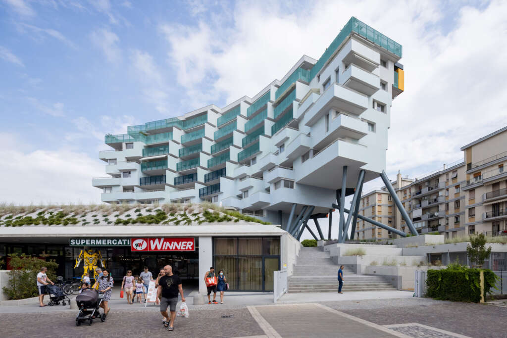 ELASTICOFarm completes mixed-use building in Italy on stilts