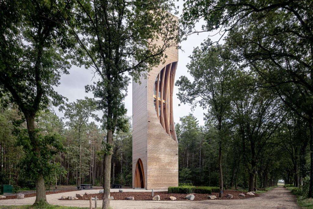 NEXT architects design wooden watchtower that is also a habitat for various bat species