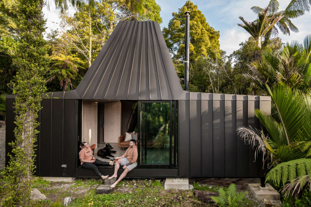 BIV Punakaiki is a mass timber cabin set in a native forest in New Zealand