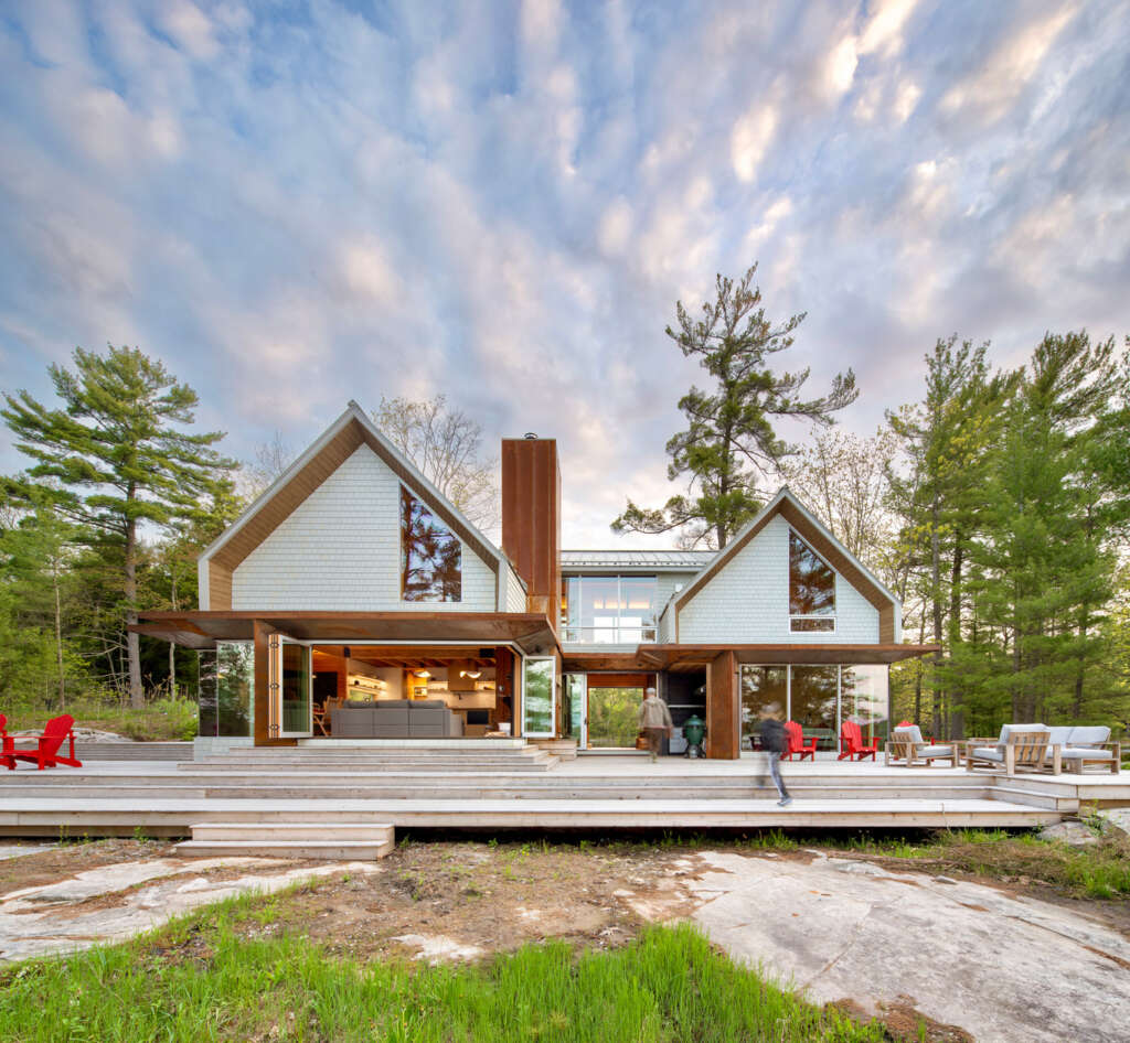 Six Mile Lake Cottage sits amidst the breathtaking beauty of the Georgian Bay landscape in Ontario, Canada