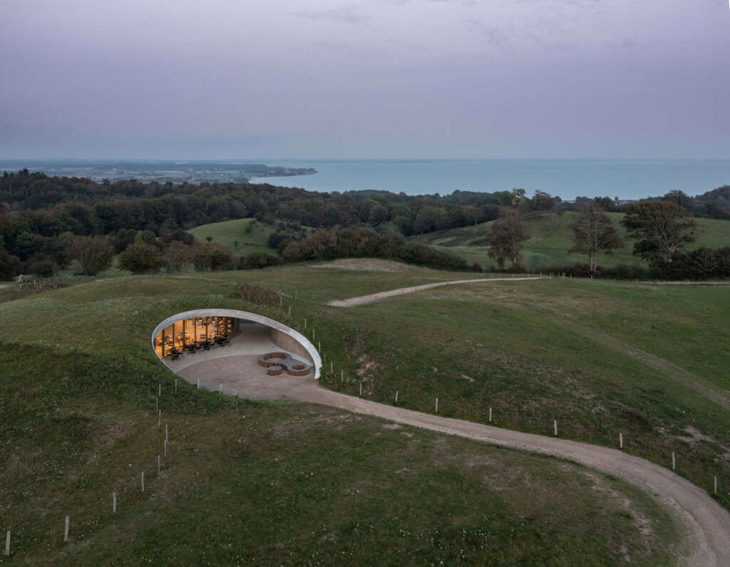 CEBRA completes sunken visitor center overlooking glacial landscape