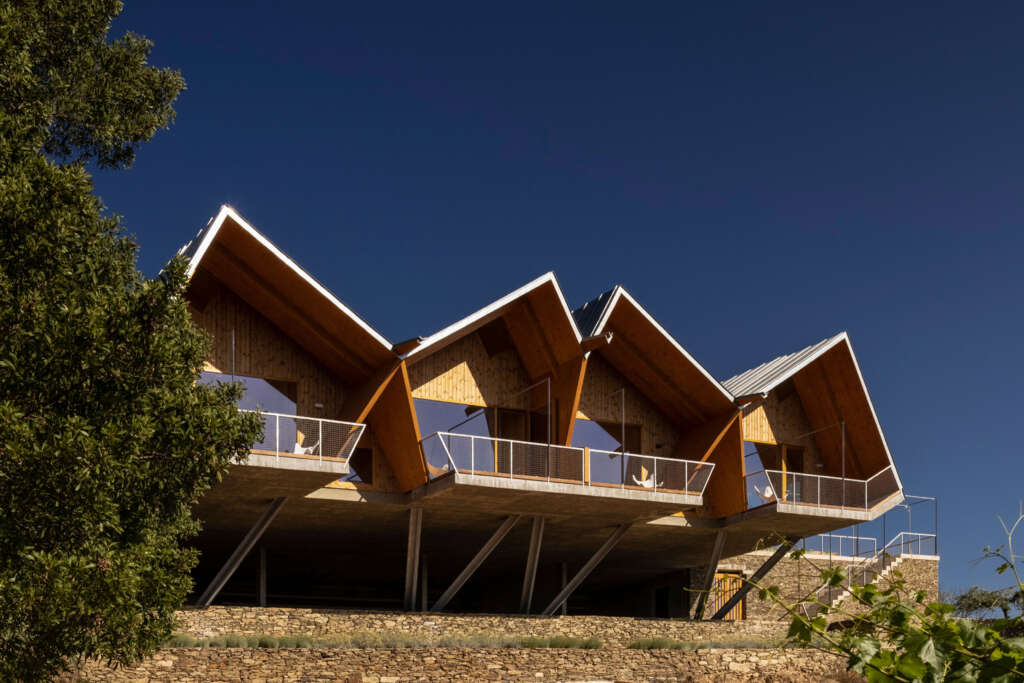 Carlos Castanheira completes angular apartments on the edge of a winery in Portugal