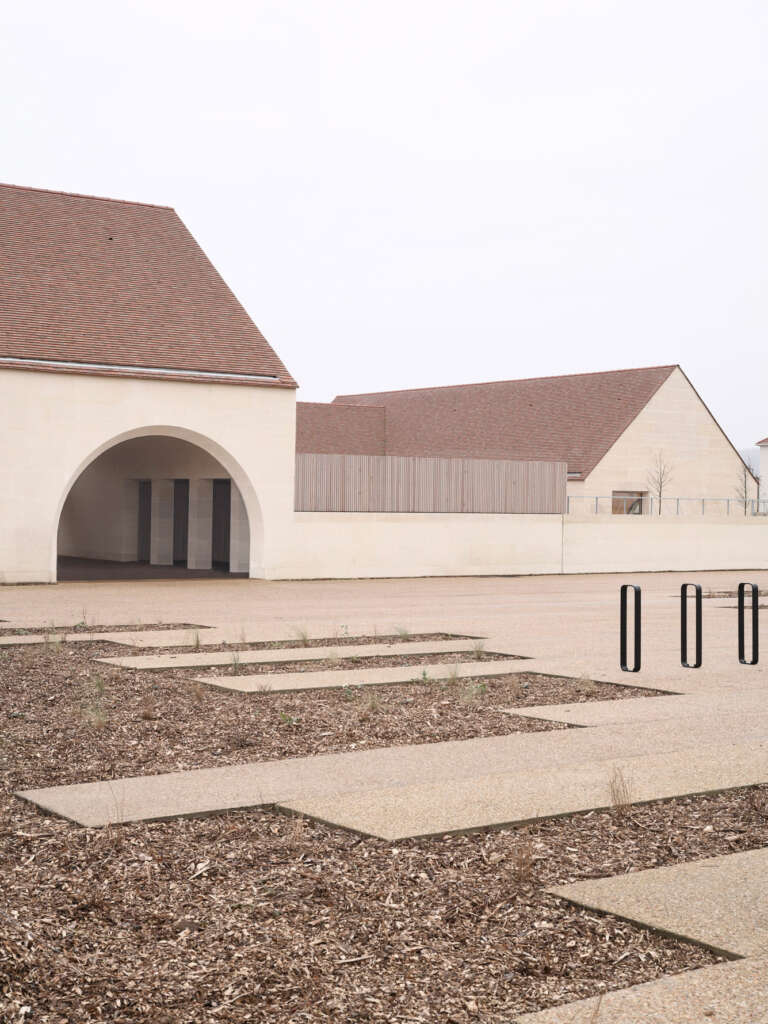 TRACKS completes stone and timber school and central kitchen in Bruyère-sur-Oise
