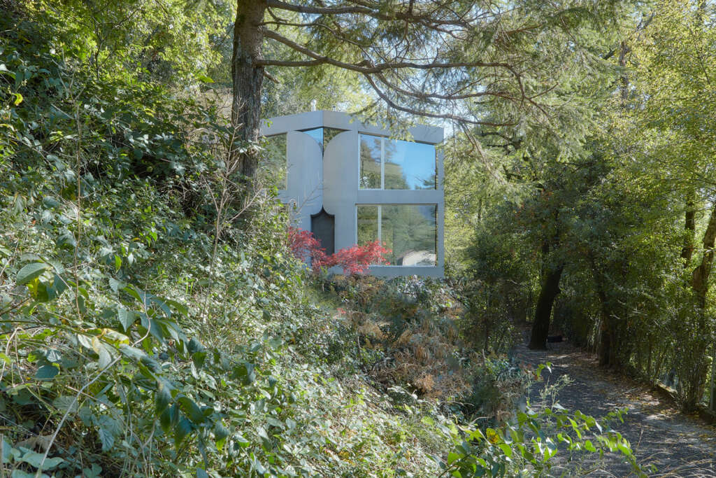 celoria Architects design folded concrete house in Switzerland designed to connect with the surrounding landscape