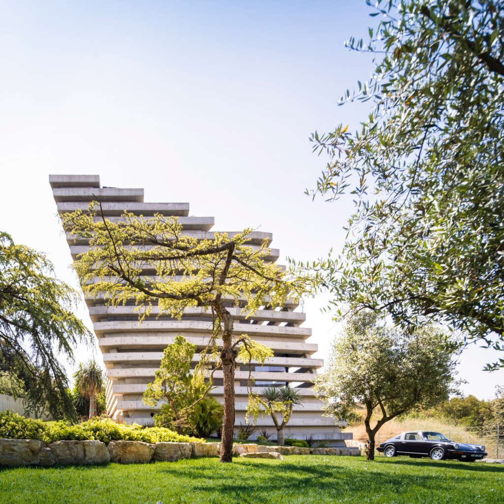 CONTAMINAR architects design volumetric house with views overlooking Leiria, Portugal