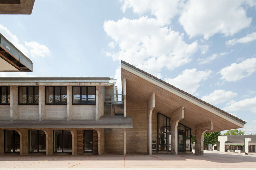 archipelago transform brutalist post office into modern learning centre in Belgium