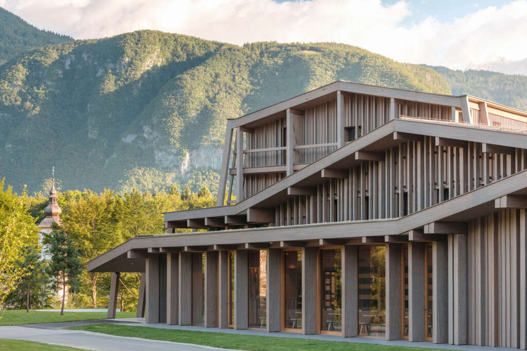 OFIS revitalize an old hotel in Slovenia with views of Lake Bohinj and the church of Janez Krstnik