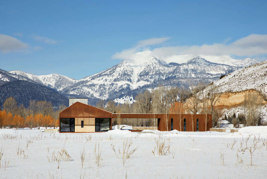 Dogtrot sits in the middle of a quiet meadow with views to the Teton Mountain Range