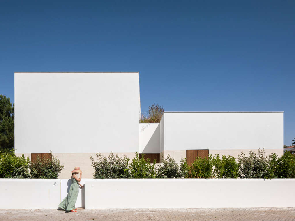Estúdio AMATAM complete holiday home in Portugal inspired by traditional wood shutters and ceramic lining