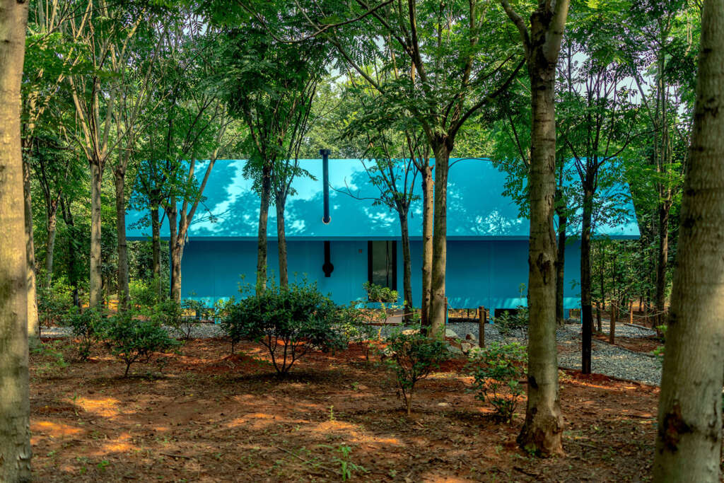 Wiki World design blue cabin in the woods of Wuhan