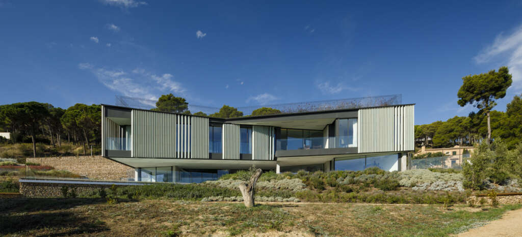 Happy House overlooks a natural cove in Girona