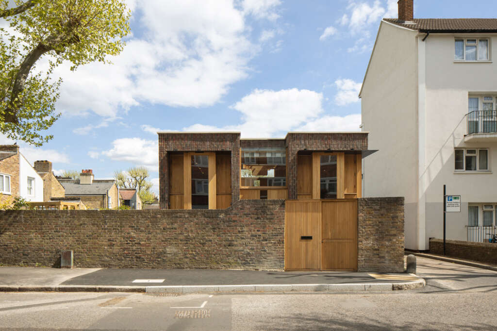 Satish Jassal Architects design vertically-bonded brick wall for house in Southwark