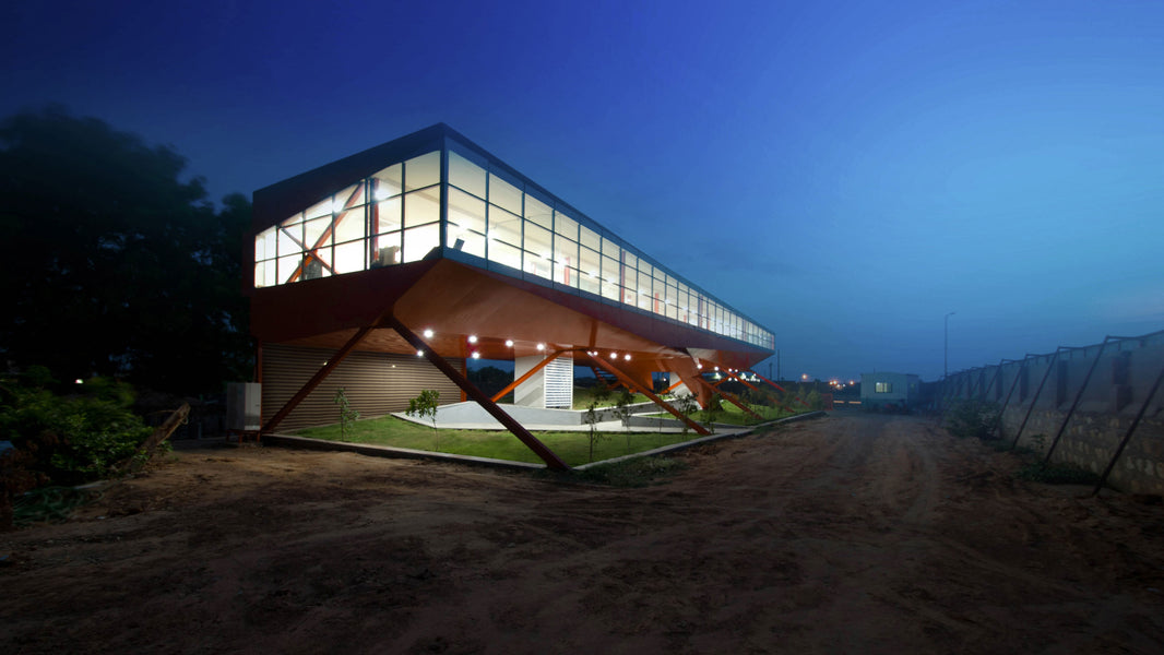 This Office Building in Ahmedabad has a Red Origami Form