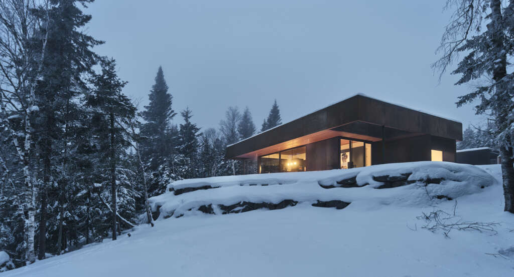 Atelier Schwimmer design corten cabin overlooking the Laurentian valley