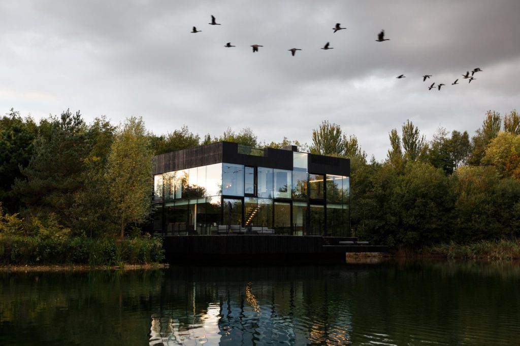 Mecanoo Designs Glass Villa on a Lake