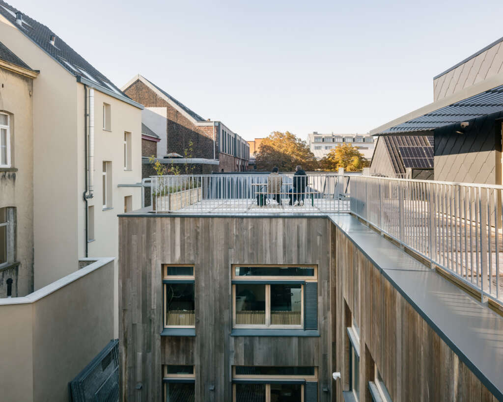 archipelago repurpose old organ factory in Brussels into new headquarters for Greenpeace Belgium