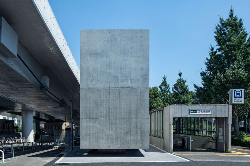 SUPPOSE Design Office creates a floating concrete restroom in Tokyo