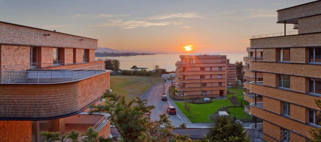 These apartments by Baumschlager Eberle Architects maximize views to Lake Constance in Lochau, Austria