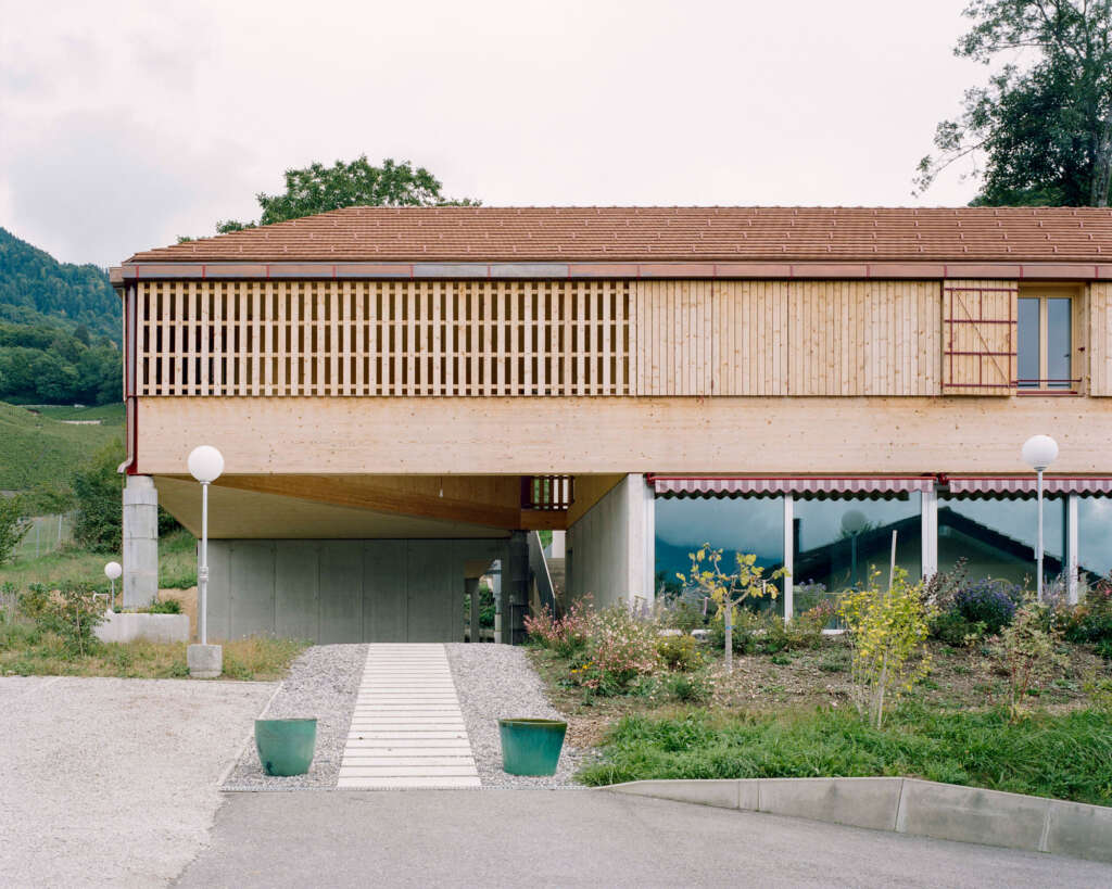Madeleine architectes and Studio François Nantermod design community housing project in the hills of Switzerland