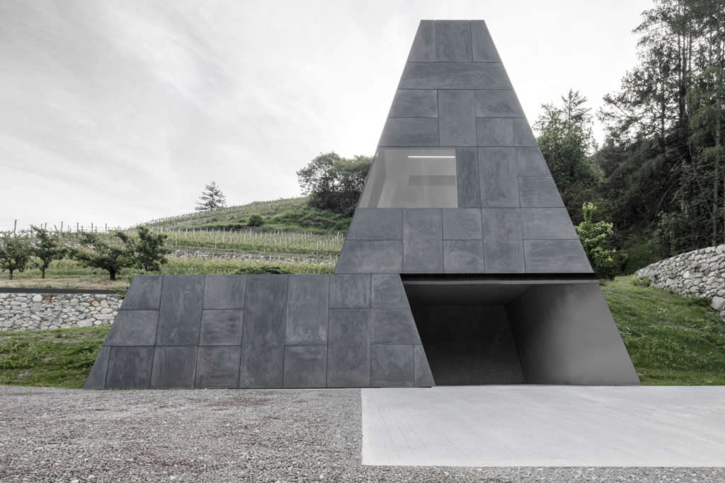 This wine cellar blends seamlessly into the South Tyrol landscape