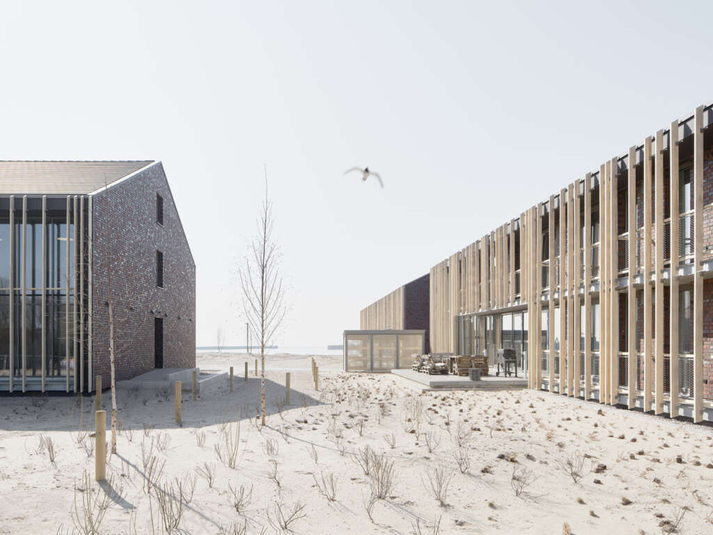 Delugan Meissl design wood & brick apartment building nestled into the dunes of northern Germany