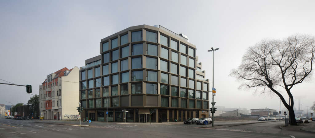 Sergei Tchoban design new Hotel Bellman Berlin-Neukoelln with dynamic bronze facade