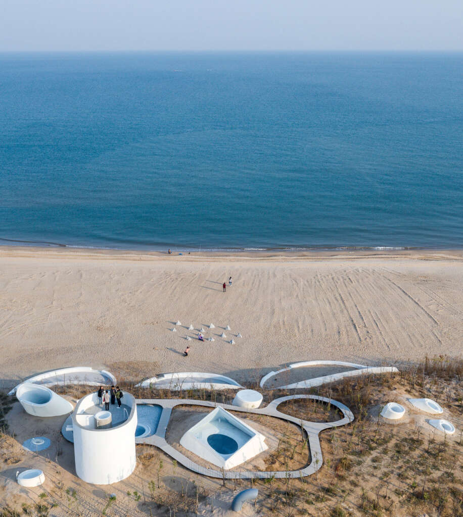OPEN Architecture design an art museum buried into the sand