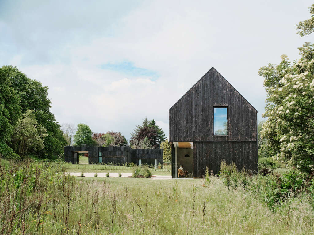 Loader Monteith completes rural headquarters and low-energy home for international mountain bike tour operator in Inverness