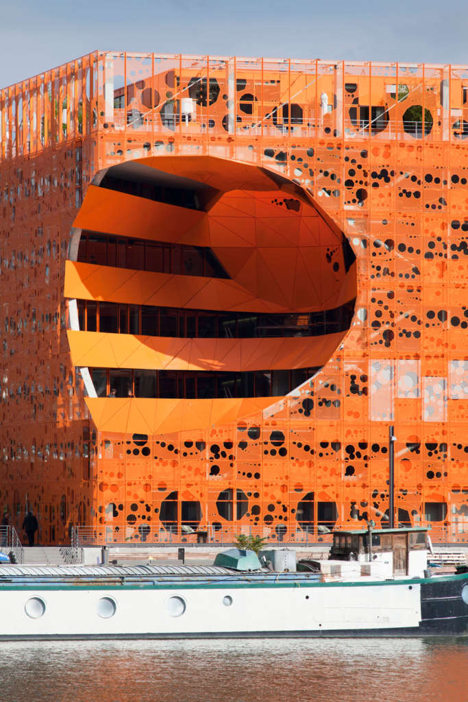 Jakob + MacFarlane place an Orange Cube in Lyon's docklands