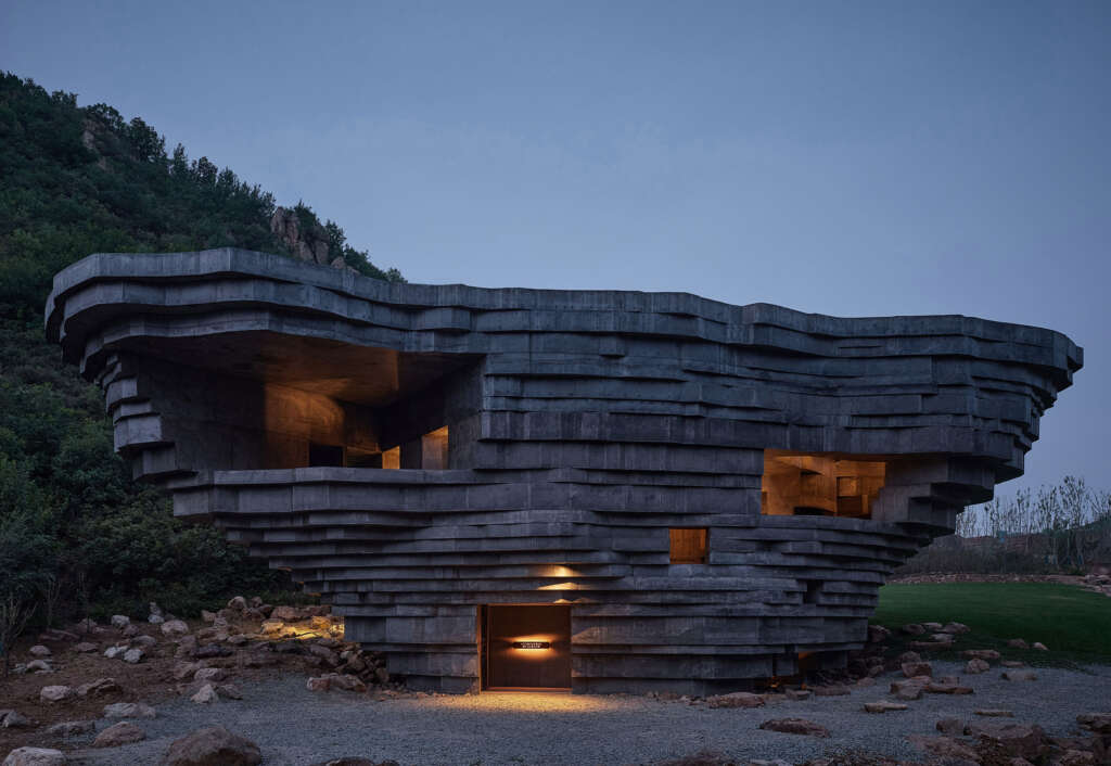 Evoking its natural surroundings, OPEN Architecture's Chapel of Sound pursues the experience of sound in its purest form