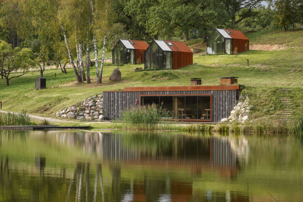 Escape to this Latvian nature spa with corten cabins and a charred wood sauna