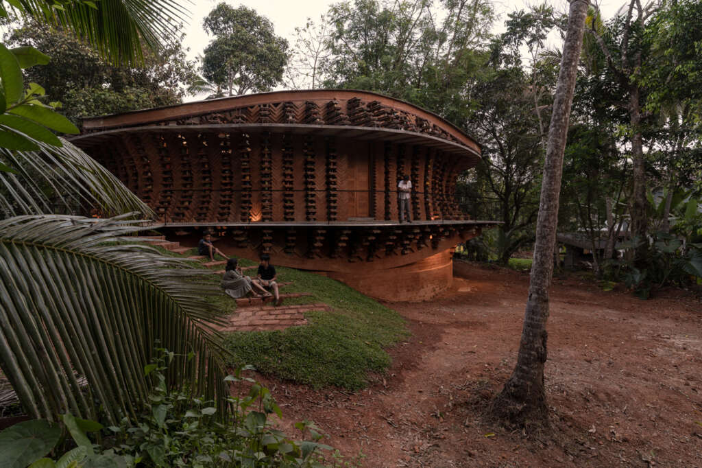 WALLMAKERS design circular home with a verandah supported by toys and old Mangalore tiles