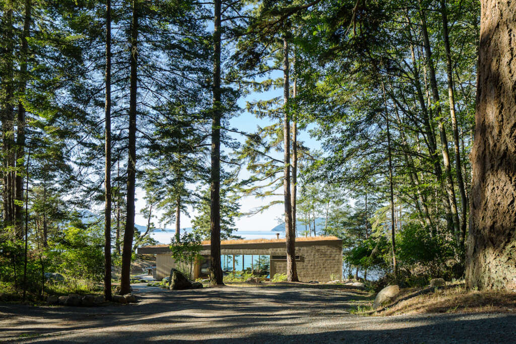 Lone Madrone, a retreat designed by Heliotrope Architects is nestled into the landscape of Orcas Island, Washington