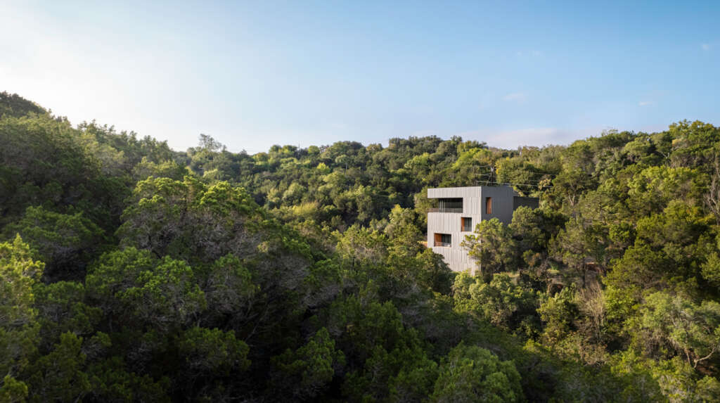 Alterstudio design tower house with views overlooking neglected ravine