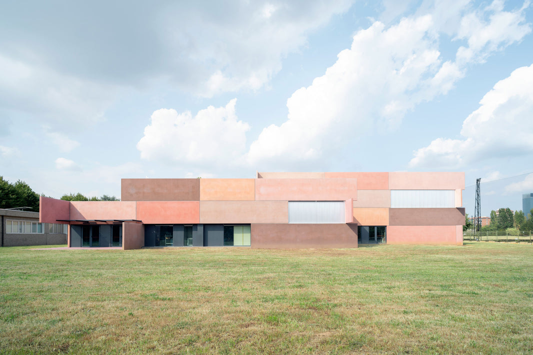 ELASTICOFarm complete research & industrial building with colorful protruding concrete panels in Turin