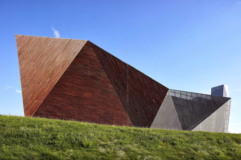 Powerbarn is a bioenergy power plant that uses wooden screens to conceal its function
