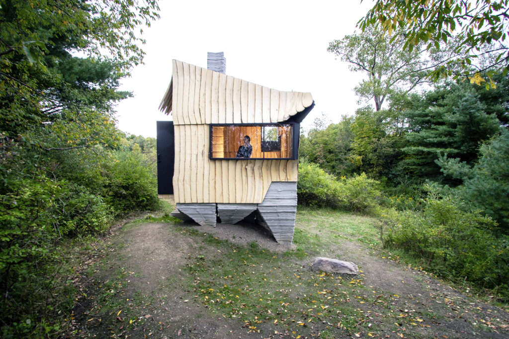 HANNAH design sustainable cabin clad with salvaged Ash wood and 3D printed concrete