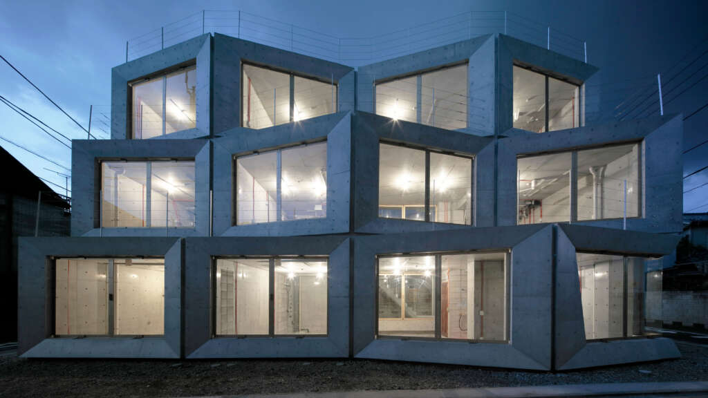 Archisan design concrete skeletal building in Tokyo designed for all forms of live, work and play
