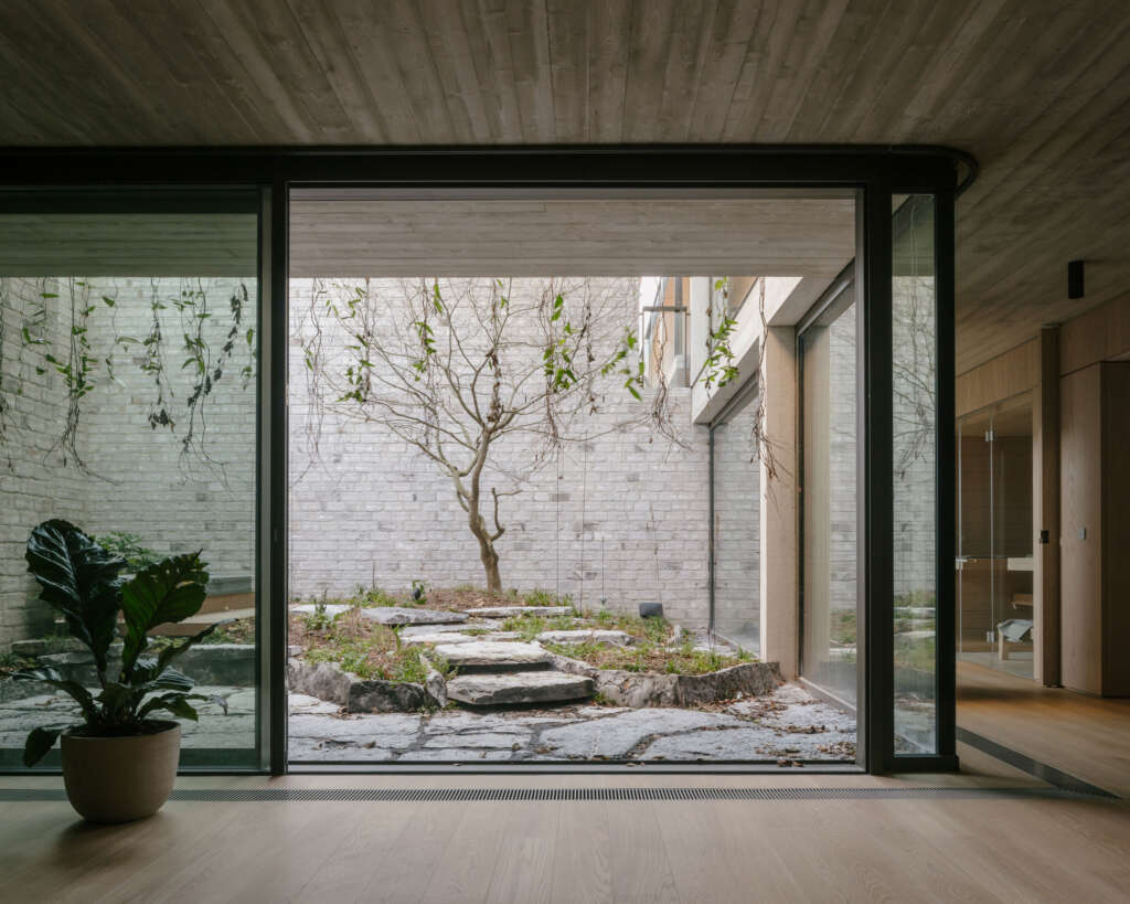 a2o designs wood and brick home with central garden in Flanders, Belgium