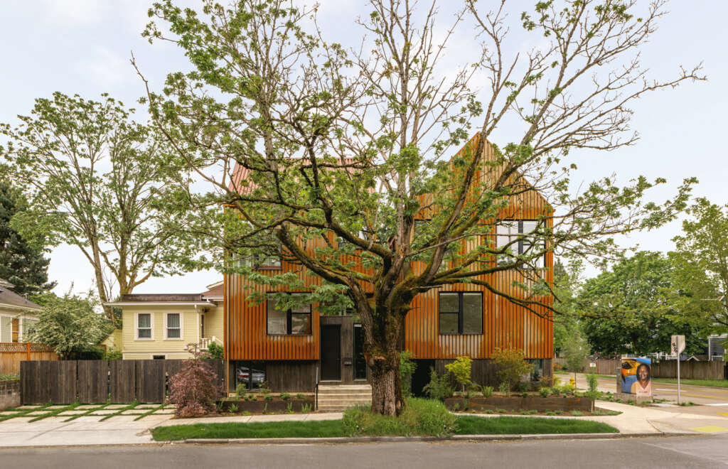 Hybrid complete rusted corten multi-family home in Seattle’s Central District