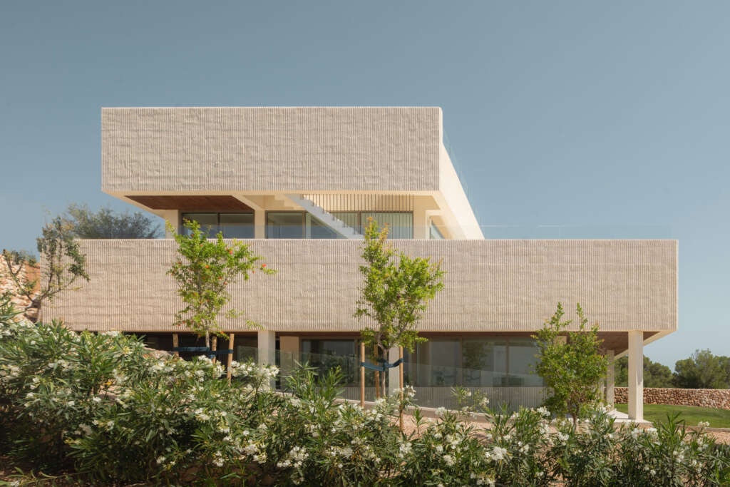 NOMO STUDIO design Spanish vacation home with fluted concrete walls